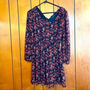 Very nice doe & Rae dress size medium black with floral pattern